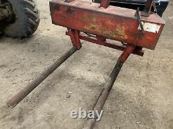 Heavy duty round bale spike with Manitou brackets Bale Squeeze/cuddler Good