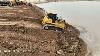 Skills Operator Bulldozer Moving Big Rock And Sand Wheel Loader Pushing Clearing To Backfill