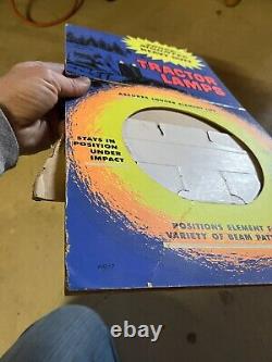 Affiche de présentoir de comptoir de lampes de tracteur robustes à montage antichoc de collection vintage.